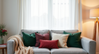 Five Christmas throw pillows in green, burgundy, cream, and gold arranged on a modern gray sofa against a white wall.