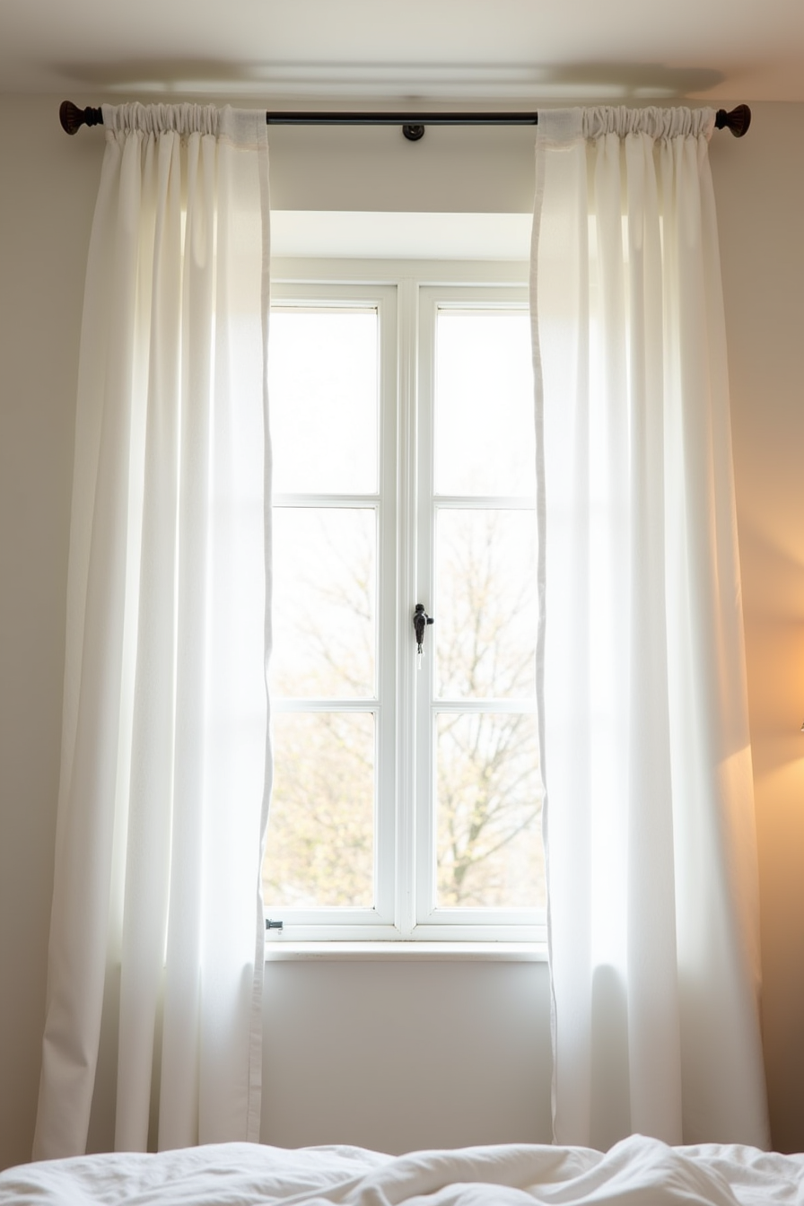 White cotton curtain panels with visible clip rings on a tension rod, featuring an adhesive hook for tie-back on the window