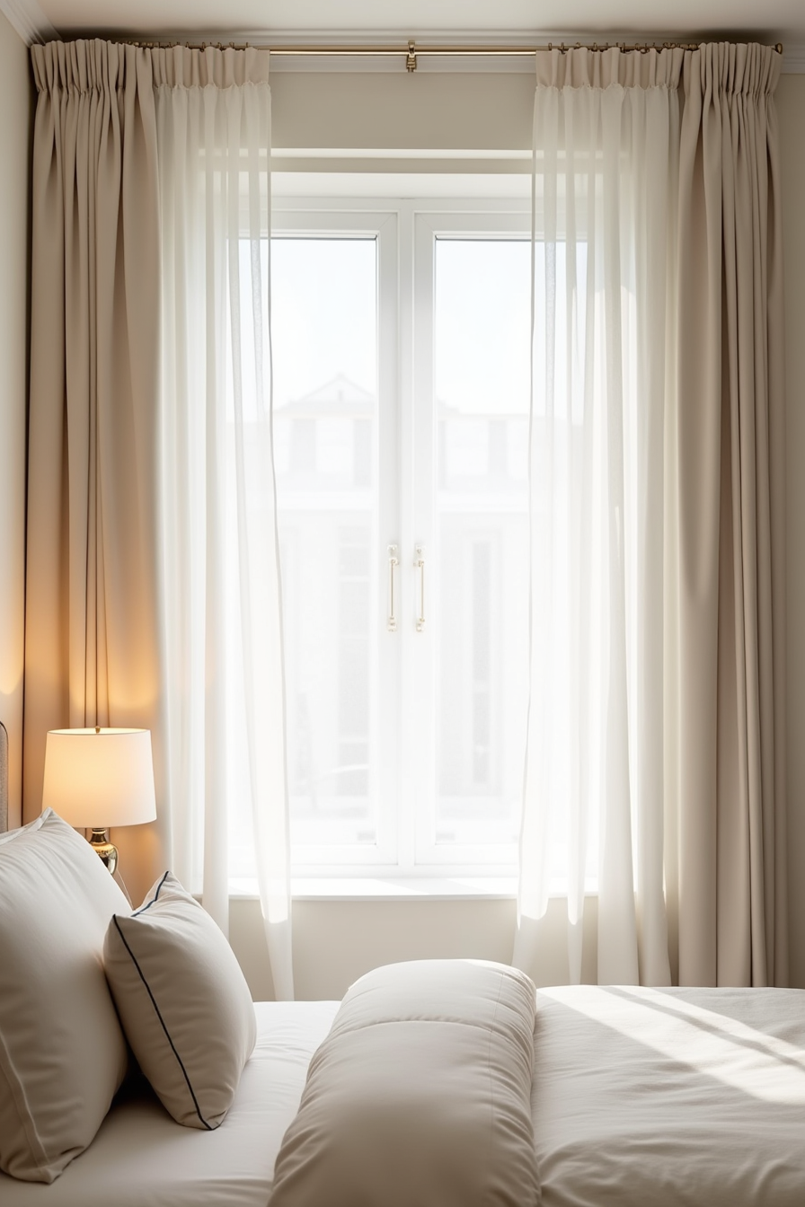 Close-up of stacked sheer voile and linen blackout curtain panels gathered on a single rod beside a bedside lamp.