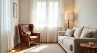 Brown leather wingback chair positioned in corner with cream sofa behind, natural light creating shadows on neutral rug.