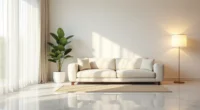 Cream sofa with brass lamp on polished marble floor, fiddle leaf fig in corner, neutral area rug visible.