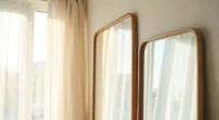 Two mirror frames side by side—natural wood with visible grain on the left, brushed metal with clean lines on the right.