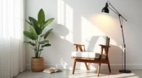 Wooden accent chair with tapered legs positioned in a corner next to a potted plant, with soft window light casting shadows